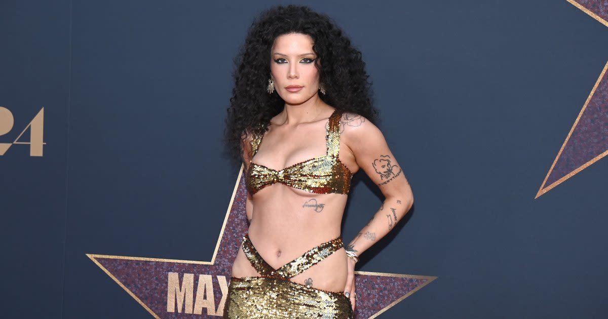 Halsey Wears Daring Gold Gown With Hip Cutouts at MaXXXine Premiere