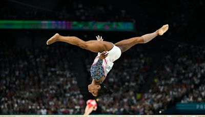 13 photos from Simone Biles' stunning performance during the women's team gymnastics final