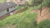 North Hills woman says a pipe is causing a landslide, flooding in her backyard