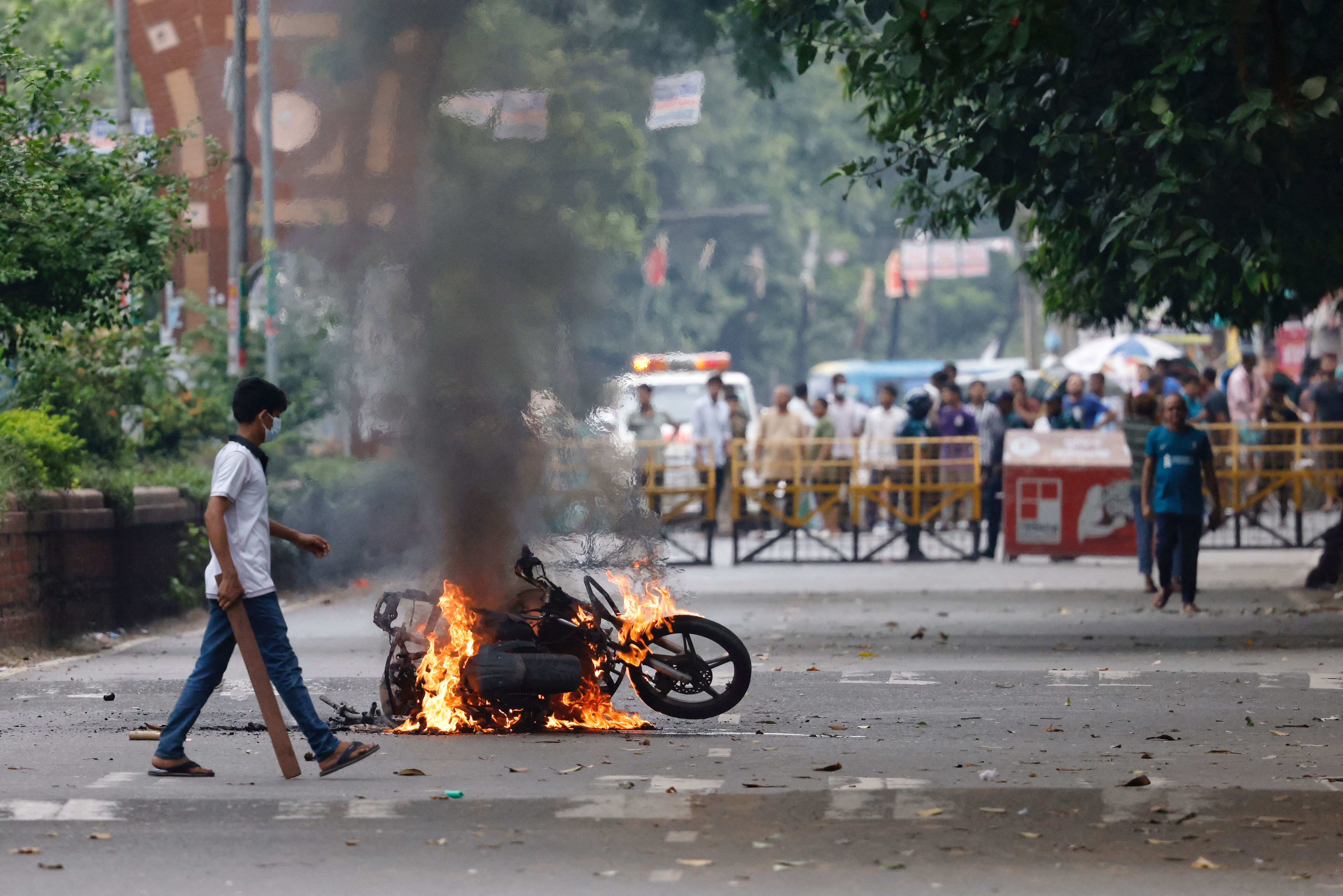 Bangladesh bans public demonstrations in capital as deadly student protests escalate