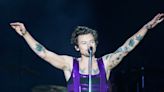 Harry Styles leads New York concert audience in applause for the Queen