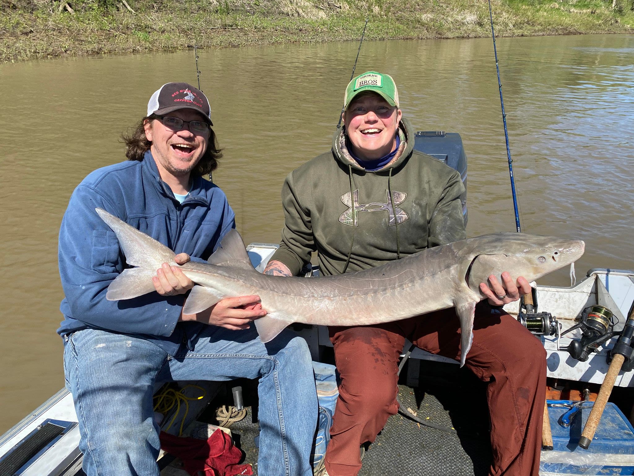 East Grand Forks woman reels in 56-inch sturgeon on the Red River during ‘Her Wilderness’ catfishing event