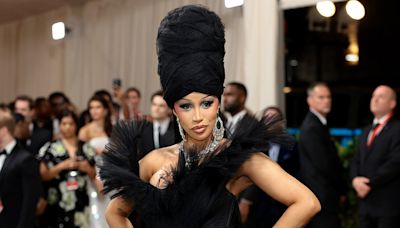 Cardi B Enlists Eight People to Carry Her Massive Gown Up the Iconic Steps at 2024 Met Gala