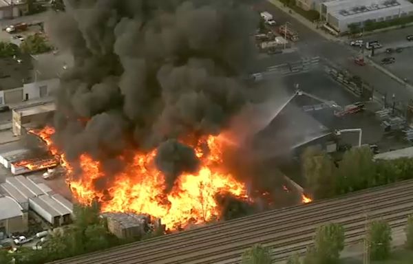 Chicago fire crews battle massive blaze at West Town pallet yard | LIVE