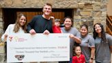 Oregon football's Bo Nix gives check to PeaceHealth Sacred Heart Medical Center RiverBend