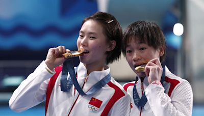 Chinese teenagers dive into Olympic history at the people's Aquatics Centre