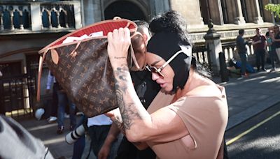 Katie Price walks free from court - but she'll have to return in days