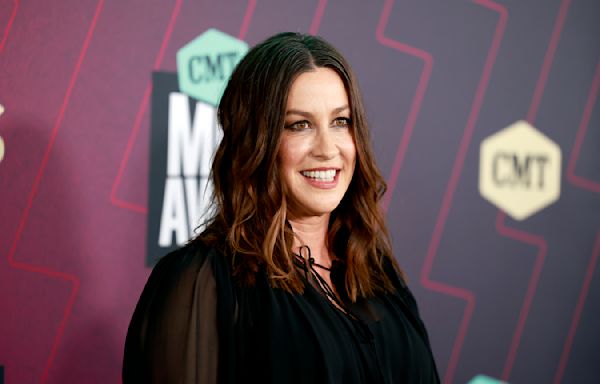 Alanis Morissette says she felt like she was 'slowly dying' amid postpartum depression: 'It's like your whole self disappears'