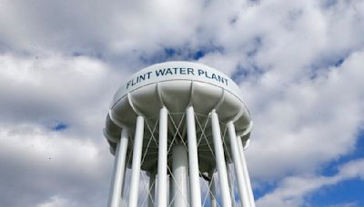 Michigan residents plagued by Flint water crisis face mounting bills for water they're afraid to use