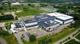 Pharma giant Lonza begins work on another expansion at Pease campus