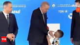 Did Turkey president Erdogan 'slap' child for not kissing his hand? Viral video sparks debate - Times of India
