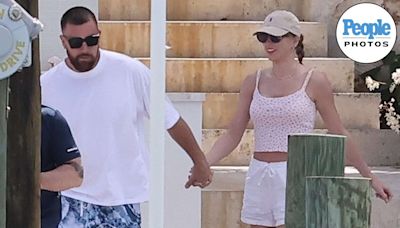 Taylor Swift Rocks Red Lipstick with Trendy Boxers and Slides for Boat Date with Travis Kelce