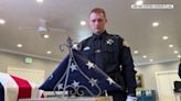 United States Honor Flag accompanies Santaquin Police Sgt. Bill Hooser during funeral