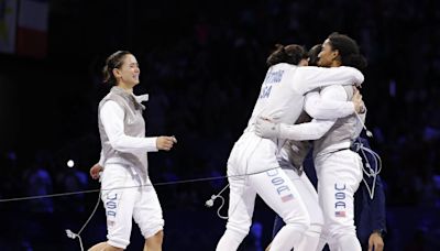 ‘My true dream.’ Lexington’s Lee Kiefer and USA make history with team foil fencing gold.