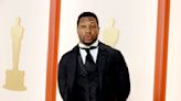 Hollywood’s Wariness Of Jonathan Majors Grows: Actor No Longer Starring In ‘The Man In My Basement’ Movie; Cut From...