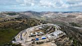 Israeli West Bank settlers 'sing and dance' after outpost recognised