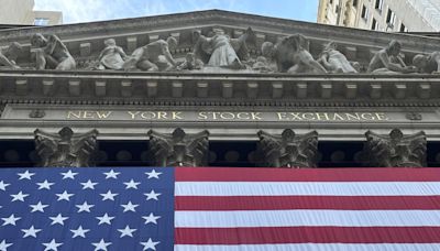 Stock market today: Wall Street hits records as a slowing economy boosts hopes for lower rates