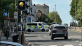 Man, 22, arrested after woman in her 60s stabbed to death on the street in Edgware