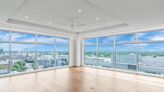 High-end finishes and high-rise views: Rare finished Falls Tower condo lists for $2.9 million