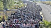 Migrant caravan in southern Mexico marks Christmas day by trudging onward