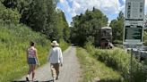 Hikers and cyclists can now cross Vermont on New England’s longest rail trail, a year after floods