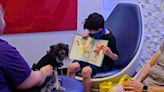 Abilene Public Library hosts ‘Read to a Dog’ day to help children improve literacy skills
