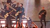 ‘Did anybody get that?’ Luke Bryan slips, falls on his back during show