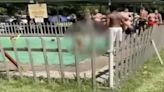 Police investigating assault of 2 Black teens by white men at a pool in South Africa after video goes viral