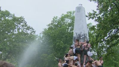 Herndon Monument climb tradition marks end of plebes first year at Naval Academy