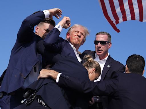 Trump injured but 'fine' after attempted assassination at rally, shooter and one attendee are dead