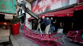 Windmill sails fall from Paris cabaret club Moulin Rouge