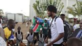 'The world knows us.' South Sudanese cheer their basketball team's rise and Olympic qualification