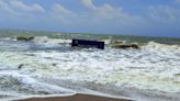 Containers of sunken cargo ship MV ITT Puma on Odisha beach