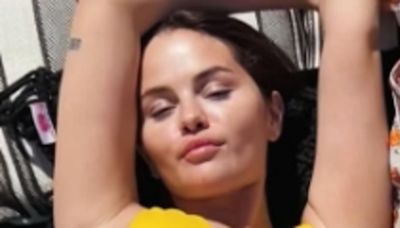 Selena Gomez rocks sexy yellow swimsuit beside boyfriend Benny Blanco