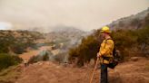 Wildfire destroys 13 homes in Northern California as heat wave continues