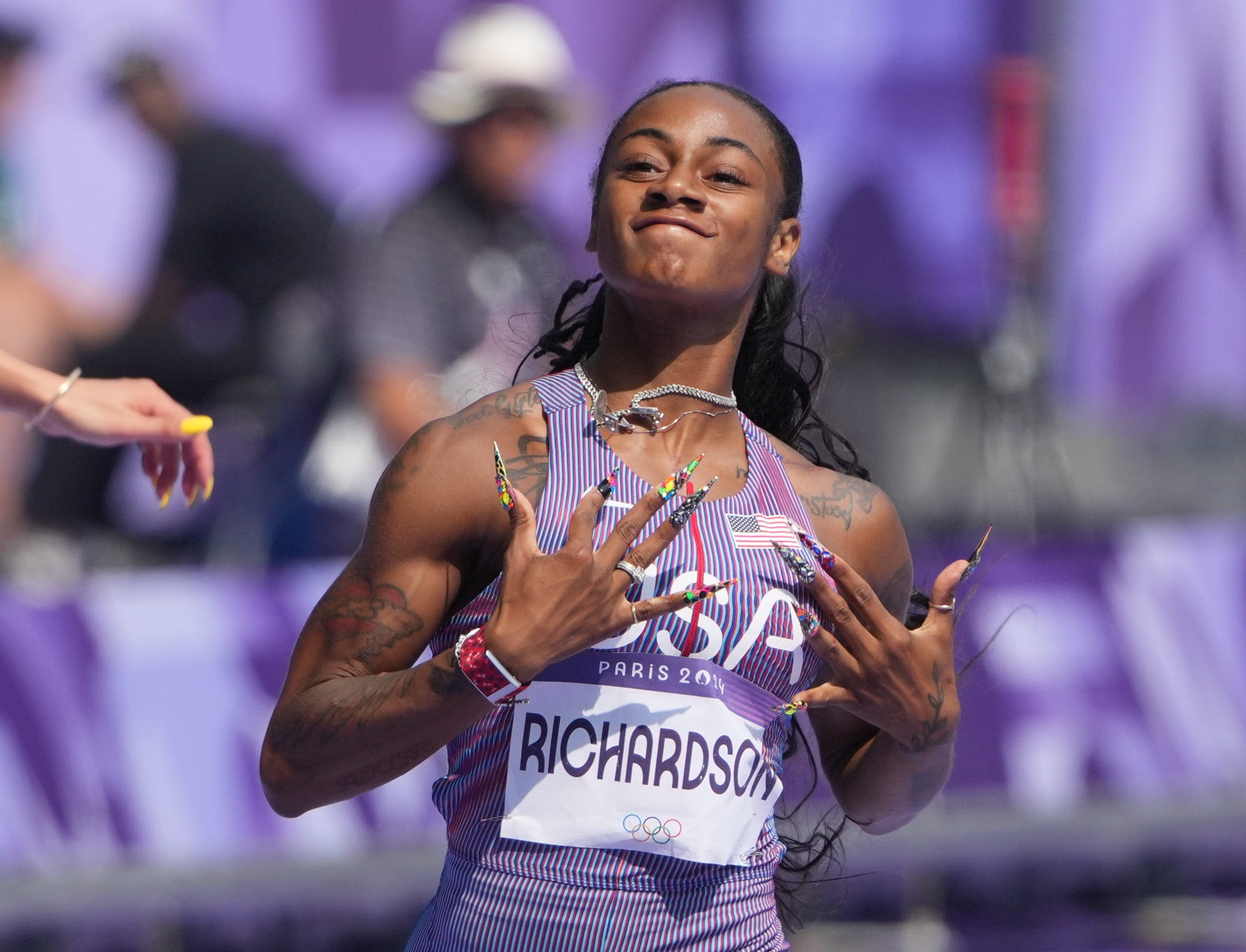Sha'Carri Richardson wins her women's 100m opening heat with ease