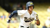 Rogers pitches Michigan to 4-2 victory over top-seeded Illinois for spot in Big Ten semifinal