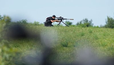 Snipers watch over Harris-Walz outdoor rally, the first since gunman opened fire on Trump in Pennsylvania