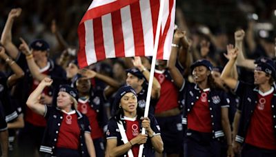20 years ago, Dawn Staley served as U.S. flag bearer. How it influenced her path to USC