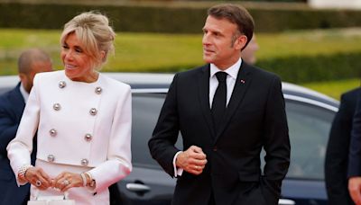 French First Lady Brigitte Macron Suits Up in Louis Vuitton Cropped Jacket and Skirt at Olympics Kickoff Gala in Paris