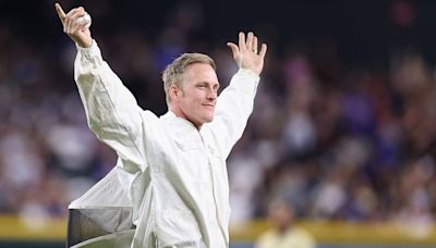 Arizona beekeeper tackles bee swarm at Diamondbacks game, throws out first pitch: 'It's pretty cool'