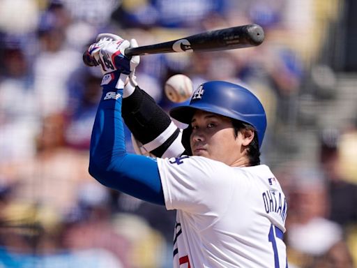 Shohei Ohtani’s first walkoff hit as a Los Angeles Dodger beats the Cincinnati Reds in extra innings