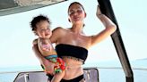 Chrissy Teigen Sports Black Bikini as She Poses with Son Wren on Thailand Vacation — See the Photo!