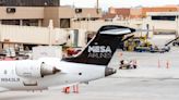 Mesa Airlines Flight was forced to halt landing to avoid collision with a departing plane
