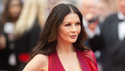 Catherine Zeta-Jones, 54, wows in tiny string bikini as she gets summer-ready