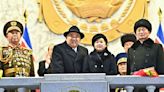Kim Jong Un shows off daughter, missiles at N. Korean parade