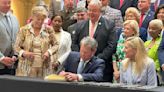 Georgia governor signs budget boosting spending, looking to surplus billions to cut taxes in future