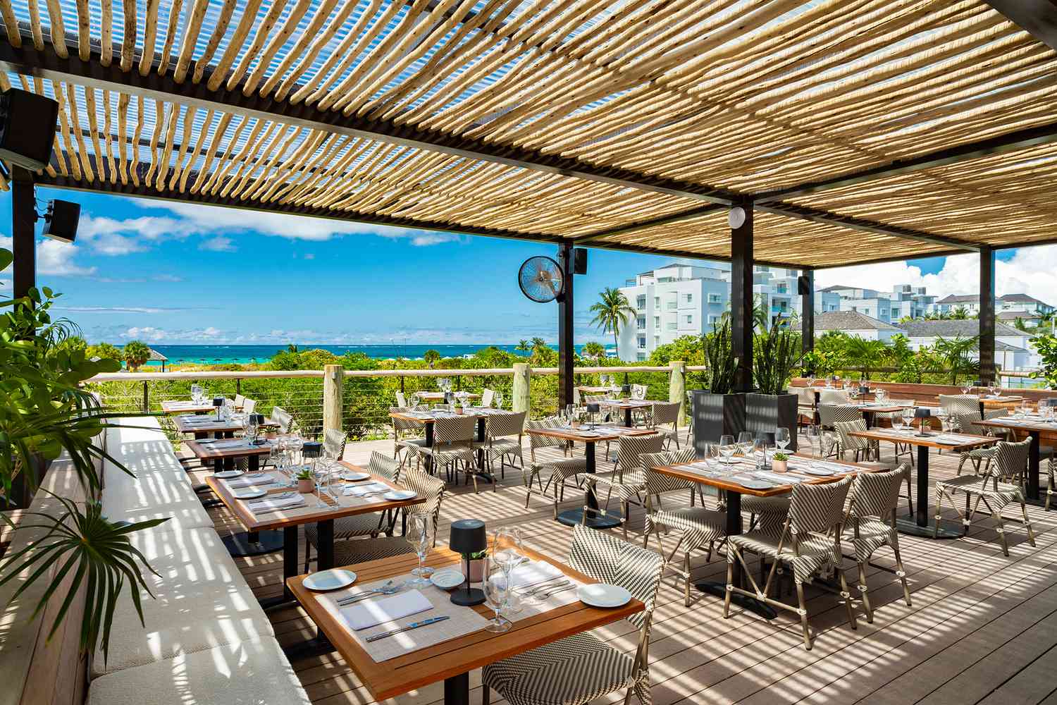 This New Celeb-loved Restaurant Overlooks the 'World's Best Beach' — and It Has Local Delicacies, Outdoor Dining, and Stunning Sunset Views