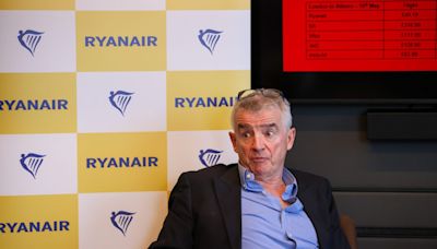 Ryanair profits nearly halved as the low-cost airline blames its ‘frugal’ customers for booking too many last-minute tickets