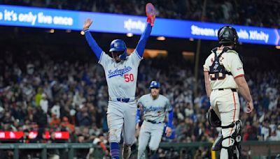 Topsy-turvy game ends with Dodgers beating Giants in extra innings